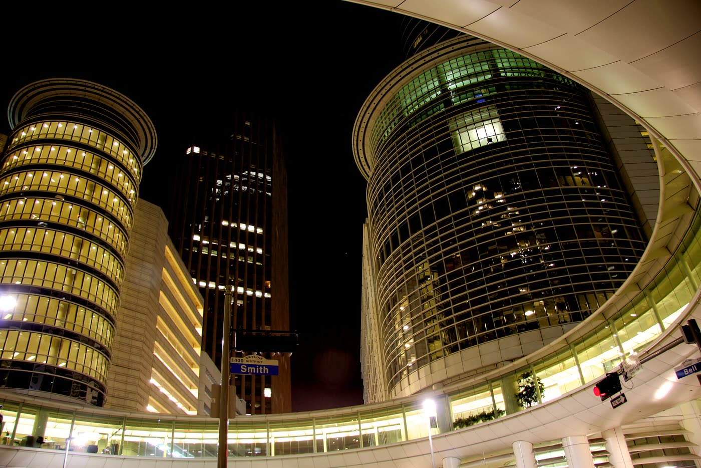The curved twin towers of the former Enron complex in Houston at night